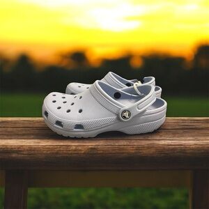 Women’s light blue CROCS, size 7.